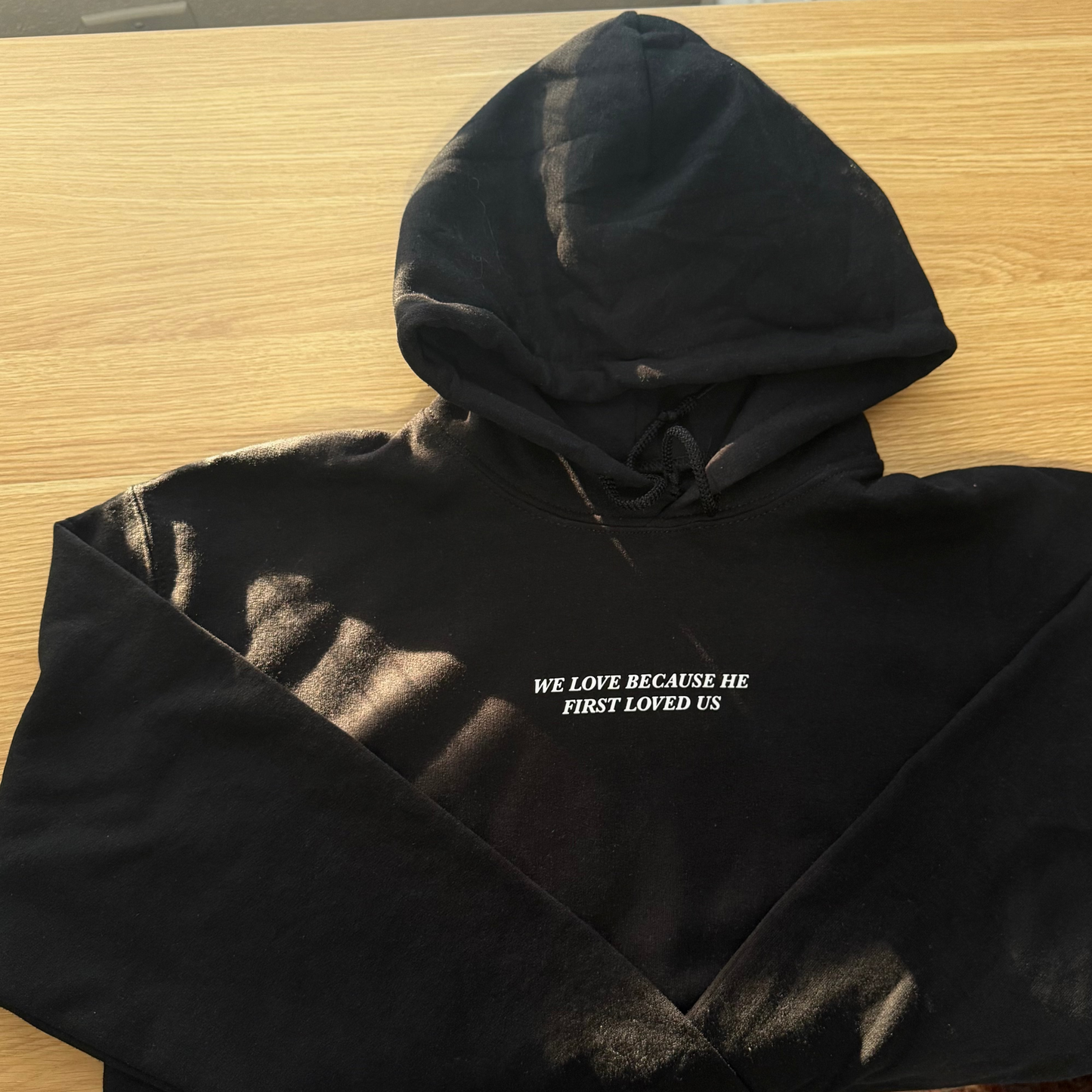 'He Would Love First' black hoodie